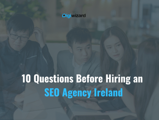 Irish business owner asking questions to an SEO agency consultant in a Dublin meeting room